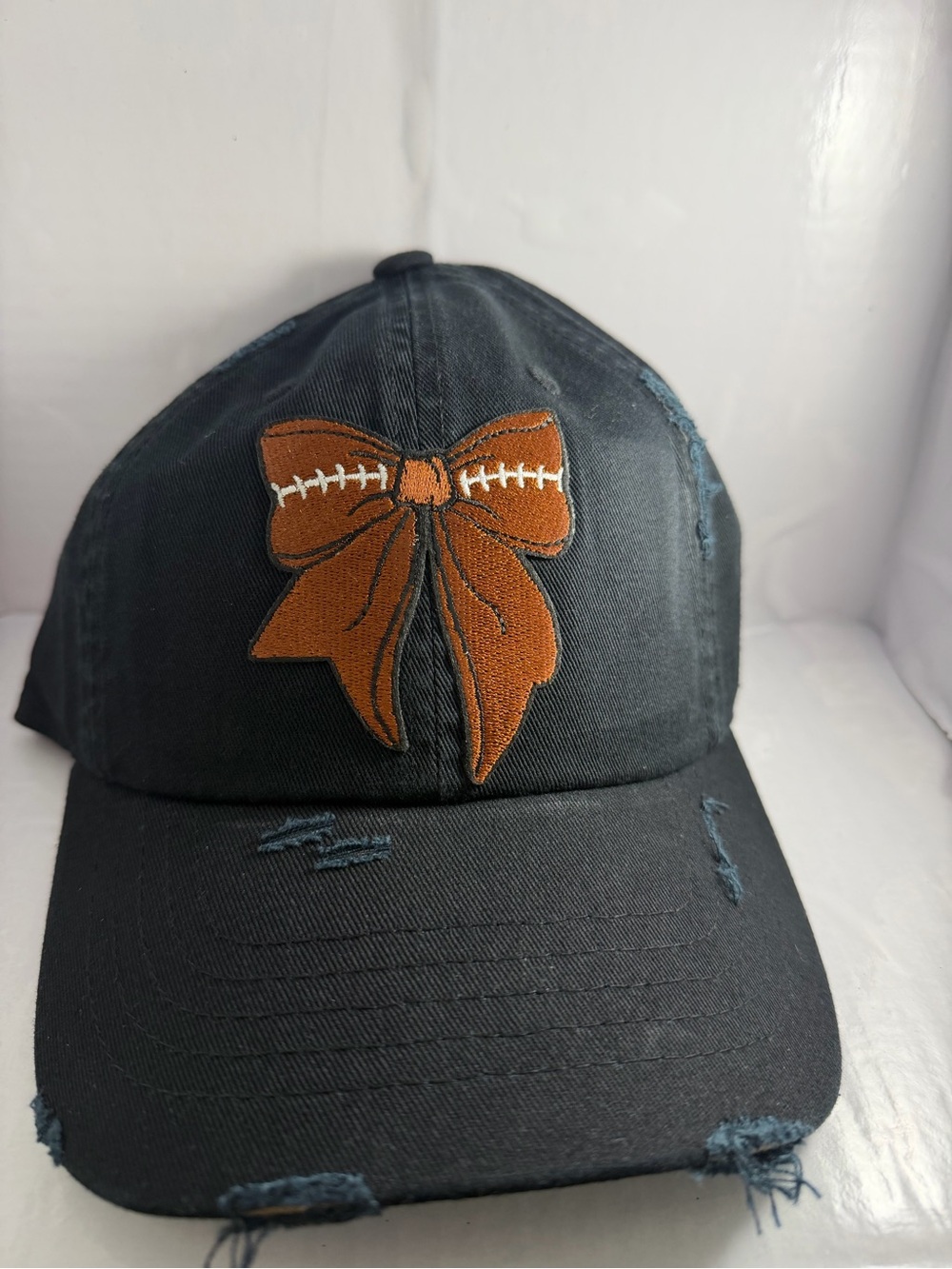Football bow hat